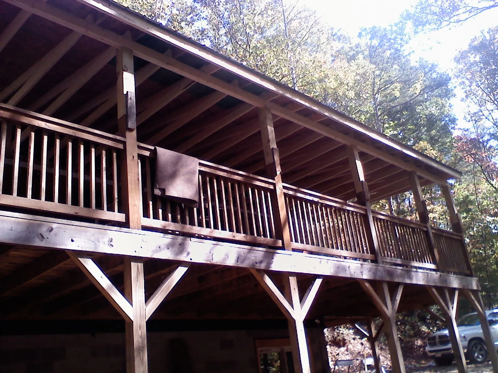 Timber framing under a new elevated porch and deck — Roof Leak Repair in Topeka by Roofing Brothers